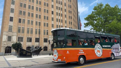 San Antonio trolley driving past Gold Star Memorial
