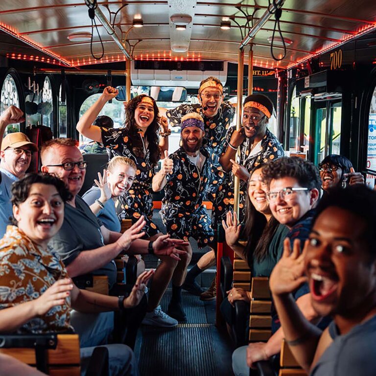 Savannah Ghost Tours for Morons guide and guests inside trolley