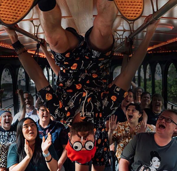 Savannah Ghost Tours for Morons guide and guests inside trolley