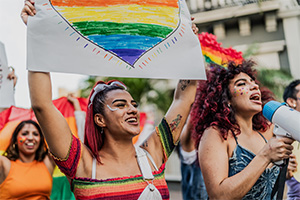The San Diego Pride Parade, featuring rainbow flags, joyful marchers