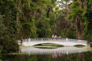 guests on bridge at Magnolia Plantation